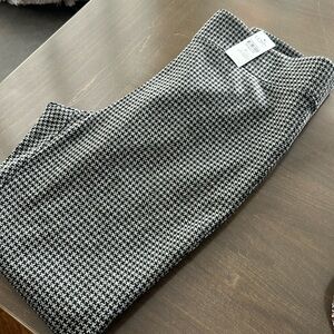 New with tags. Black and gray check leggings